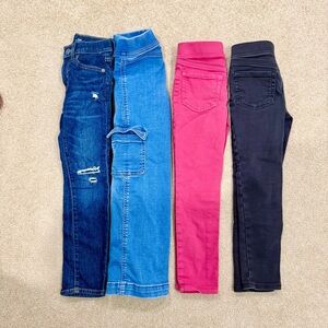 (Set of Four) Girls size 7 Stylish Jeans/Jeggings in Blue, Pink, and Black